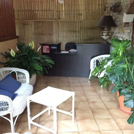 Le Phoenix Hotel Saint Florentin Bagian luar foto
