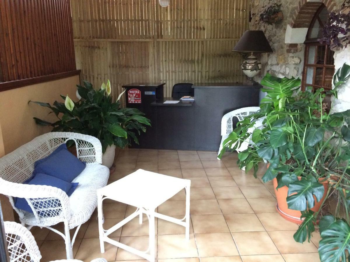 Le Phoenix Hotel Saint Florentin Bagian luar foto